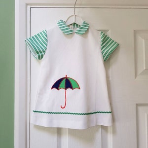 Vintage unworn 1970s baby's/toddlers white and green dress with cute umbrella motif suitable for 2 year old image 1