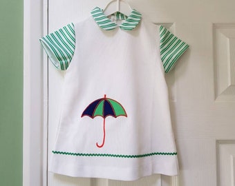 Vintage unworn 1970s baby's/toddler’s white and green dress with cute umbrella motif (suitable for 2 year old)