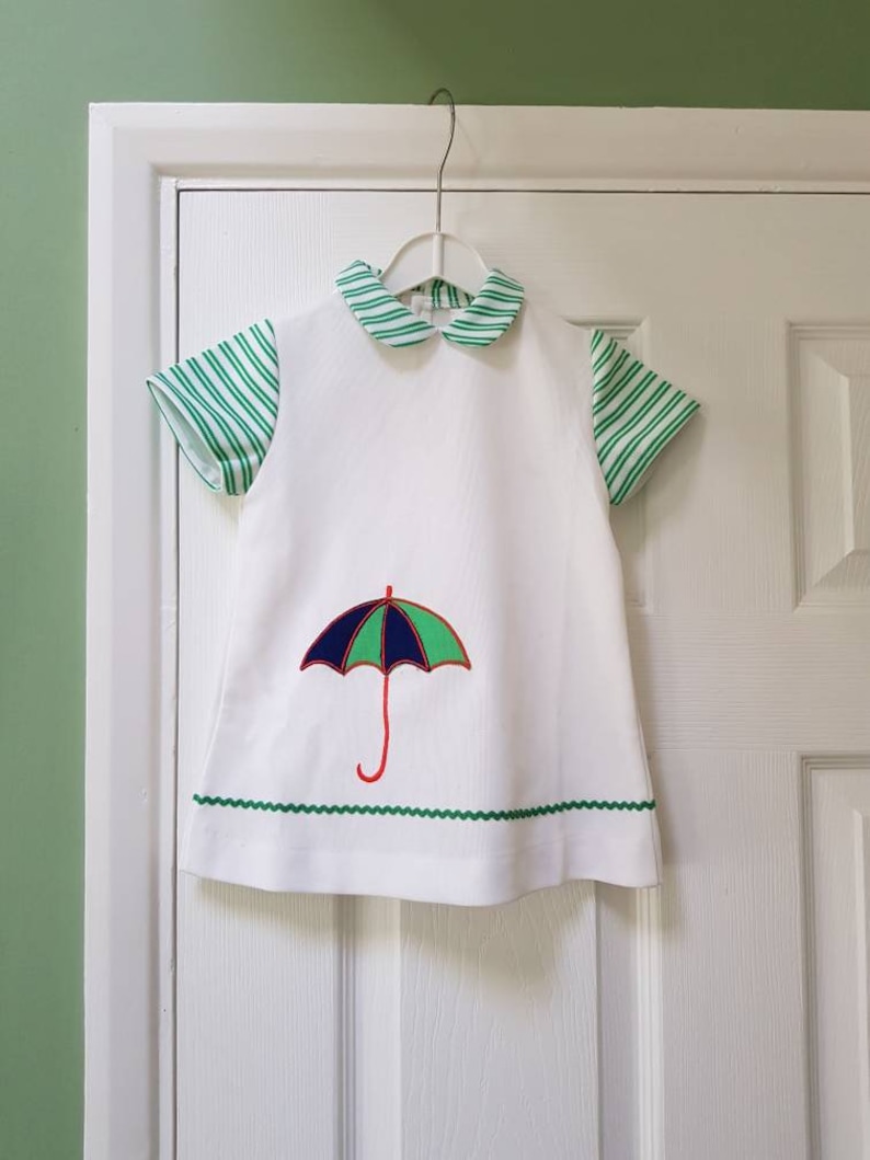 Vintage unworn 1970s baby's/toddlers white and green dress with cute umbrella motif suitable for 2 year old image 1