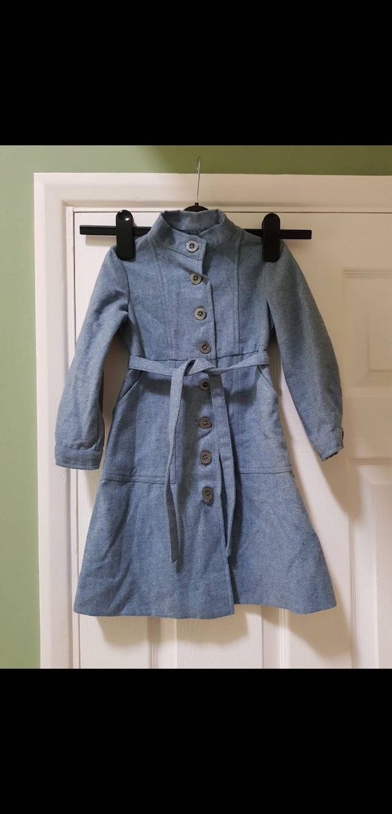 Vintage 1970s children’s blue smock dress, unworn 