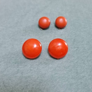 Vintage 1960s clip-on round orange earrings - lot of 2 pairs