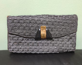 Vintage 1980s black embossed leather envelope clutch handbag purse with brass tone decorative clasp