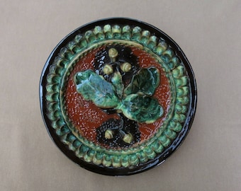A unique Uzbek Bukhara ceramic plate with acorns