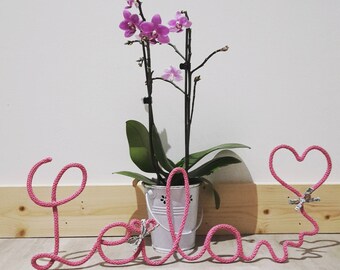 Knitting with puffed heart shaped initials