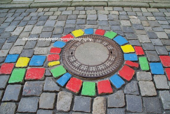 mosaic wall art manhole