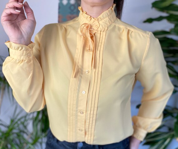 yellow blouse with bow