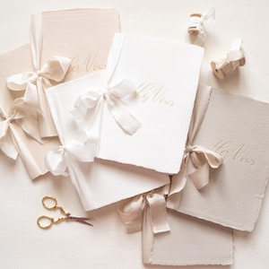 GOLD FOIL PRESSED Pair ‘his and hers’ Wedding Vow Books on Handmade Paper with Silk Ribbon | Flat lay styling | Blush | White | Taupe
