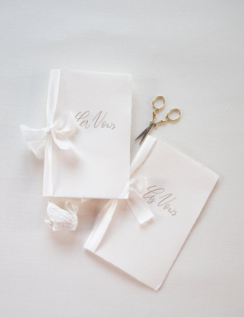 Ivory handmade paper vow book with gold letterpress ink