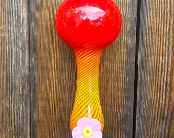 Glass hummingbird feeder, with orange, yellow, and red