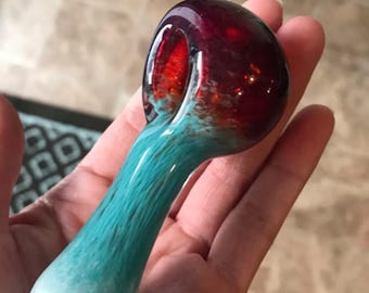 Glass pipe with white, teal, and amber purple