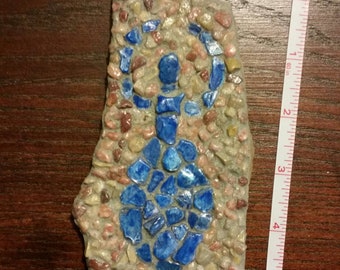 Goddess mosaic on stone
