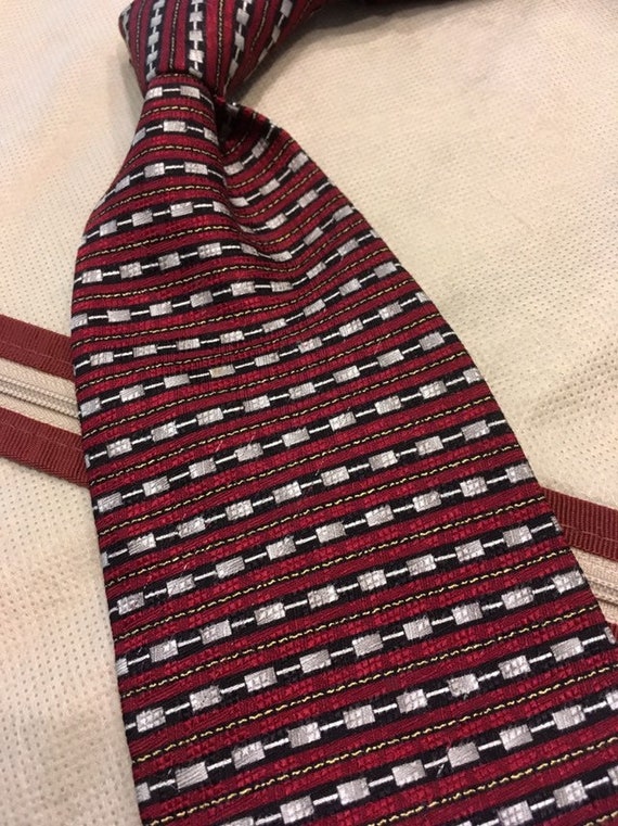 Feraud heavily textured pure silk tie  in a deep r