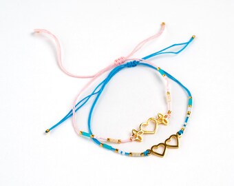 Dúo de pulseras con forma de corazón para niñas - Azul/Rosa