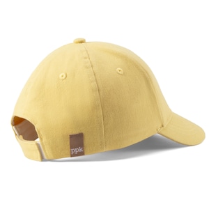 May include: A yellow baseball cap with a brown label that says "ppk" on the back.