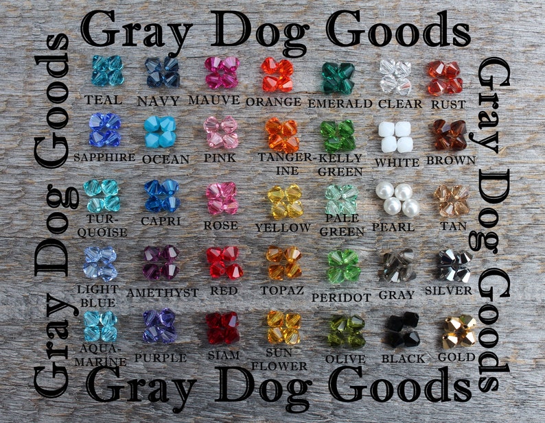 May include: A chart of 36 different colored crystal beads, with the name of each color written below the bead. The chart is labeled "Gray Dog Goods" at the top and bottom.
