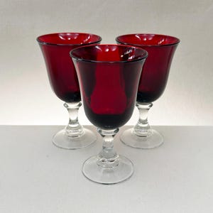 Vintage Ruby Red Heavy Glass Water or Wine Goblets with Clear Hour Glass Shaped Baluster  Stems, Set of Three (3) Holiday Glassware
