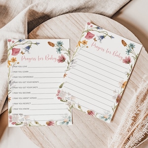 May include: Two printable cards with a floral border and the text "Prayers for Baby". The cards have a list of prayers for a baby, such as "I pray you love", "I pray you learn", and "I pray you experience".