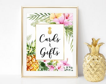 May include: A printable sign with tropical floral and pineapple designs. The sign says "Cards & Gifts" in black cursive text.