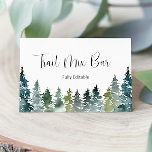 May include: A rectangular white card featuring the black text Trail Mix Bar and the smaller text Fully Editable. The bottom portion of the card displays a watercolor illustration of a dense forest of pine trees in shades of dark and light green.