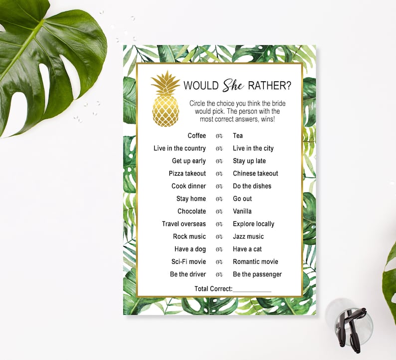 May include: A green and white tropical-themed printable game card with the text "Would She Rather?" and a list of questions with two choices each. The card features a pineapple graphic.