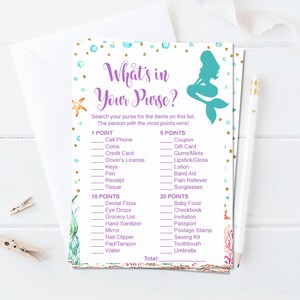 May include: A printable game card with a mermaid illustration and the text "What's in Your Purse?"  The card lists common items found in a purse and assigns points to each item.  The person with the most points wins.