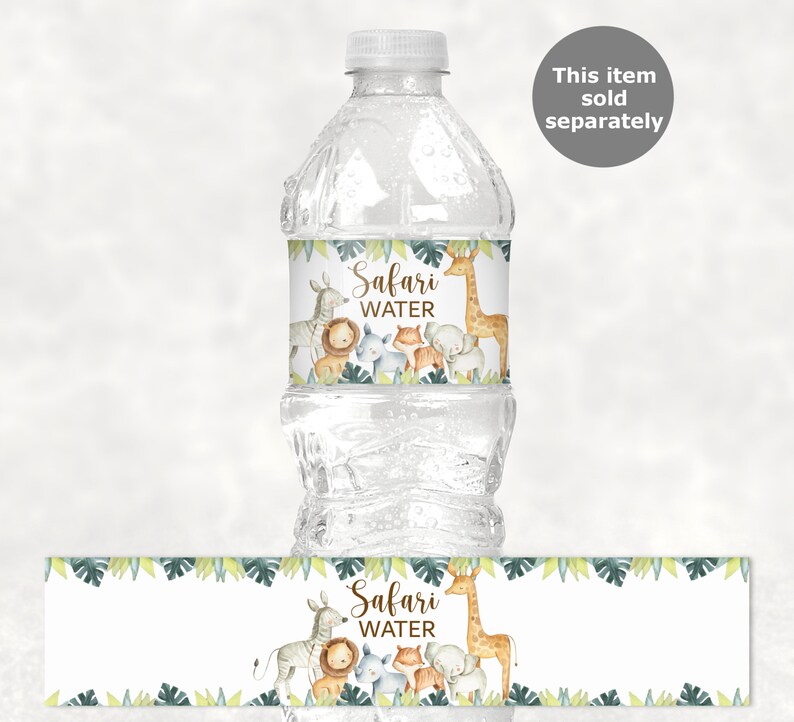 May include: A clear plastic water bottle with a label that reads "Safari Water." The label features watercolor illustrations of safari animals, including a zebra, lion, giraffe, and elephant, with green foliage. A separate label is also shown.
