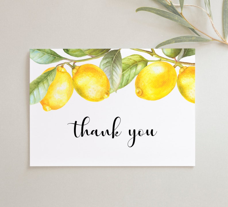 May include: A white card with a lemon branch illustration and the text "thank you".