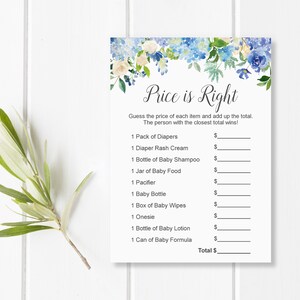 May include: A baby shower game card titled "Price is Right" with a floral border in shades of blue and white. The card lists baby items with spaces to guess their prices, including diapers, baby shampoo, and formula.