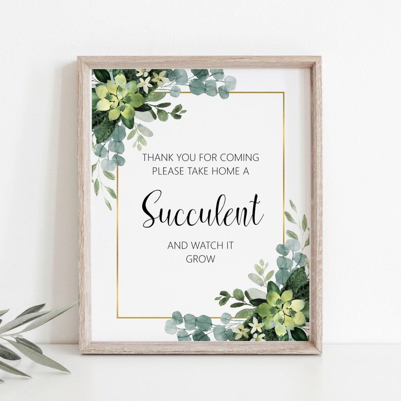 May include: A white sign with a gold frame and green watercolor succulents. The sign says "Thank you for coming, please take home a succulent and watch it grow."
