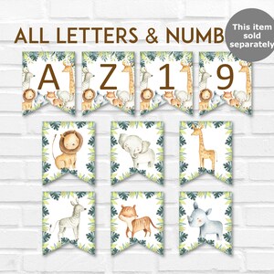 May include: A set of decorative banner flags featuring jungle animals and letters and numbers. The flags are decorated with watercolor illustrations of lions, giraffes, elephants, zebras, tigers, and rhinos. The text "ALL LETTERS & NUMB" is at the top.