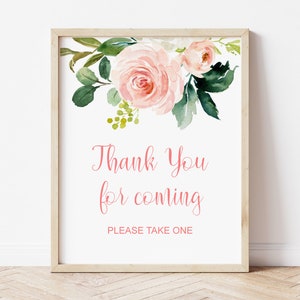 May include: A framed sign with a watercolor floral design. The top of the sign features pink roses and green leaves. The text "Thank You for coming" is written in pink script, with "PLEASE TAKE ONE" below.