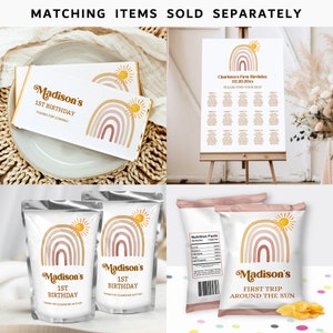 May include: A set of party supplies featuring a rainbow and sun design in shades of pink, brown, and yellow. The set includes a chocolate bar wrapper, a chip bag, a pouch, and a seating chart. The text on the items reads "Madison's 1st Birthday" and "First Trip Around The Sun".