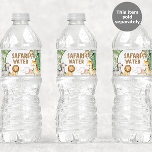 May include: Three clear plastic water bottles with labels that say "Safari Water". The labels feature a jungle theme with animals such as a lion, zebra, giraffe, and elephant.