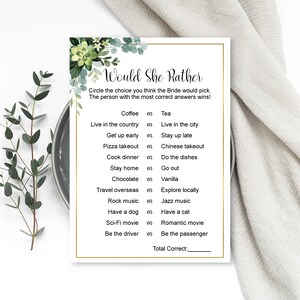 May include: A printable bridal shower game with a green floral design. The game asks guests to circle the choice they think the bride would pick from a list of 12 questions. The game includes the text "Would She Rather" and "Total Correct: ".