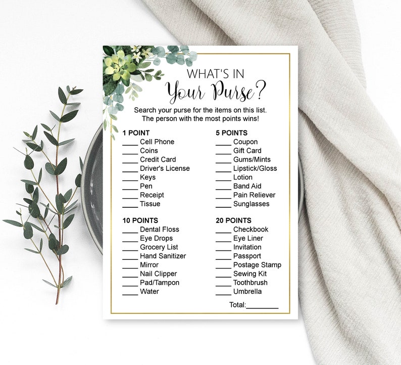 May include: A printable game card with a green floral design. The card has a list of items to find in a purse, with points assigned to each item. The title of the game is "What's in Your Purse?"