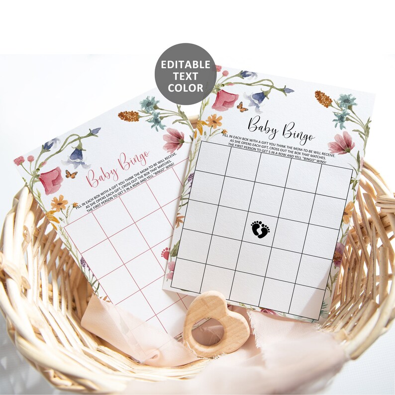 K&ouml;nnte beinhalten: Zwei florale Baby-Bingo-Karten in rosa und wei&szlig;. Die Karten haben ein Raster mit Feldern, die ausgef&uuml;llt werden, wenn Geschenke bei einer Babyparty ge&ouml;ffnet werden. Der Text auf den Karten lautet "Baby Binge".