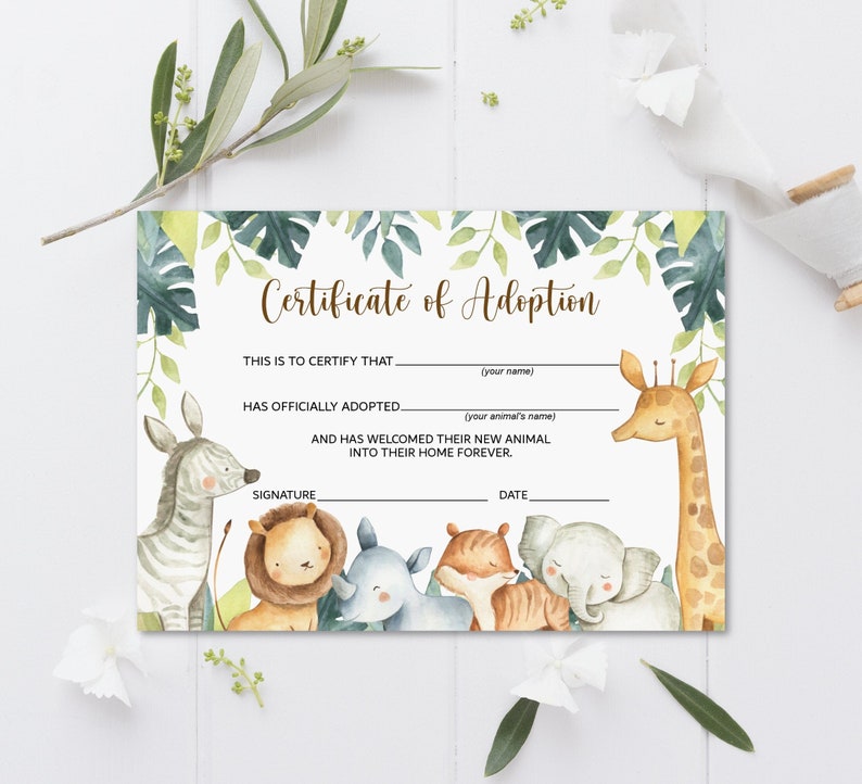 May include: A Certificate of Adoption with watercolor illustrations of a zebra, lion, rhino, fox, elephant, and giraffe. The certificate has text that reads "Certificate of Adoption" and includes spaces for the adopter's name, animal's name, signature, and date.