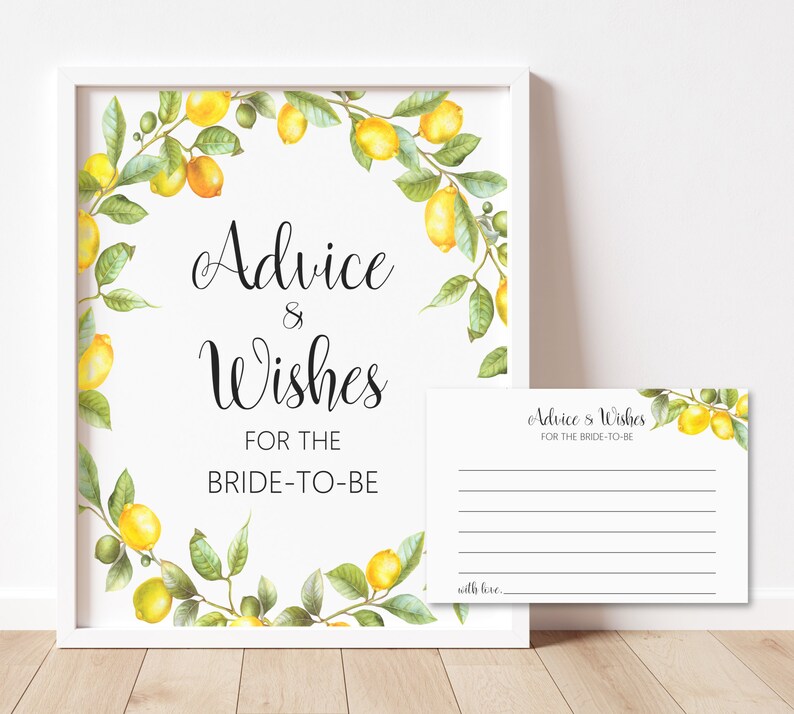 May include: A printable sign with a lemon wreath border and the text "Advice & Wishes for the Bride-to-Be". A smaller card with the same text and a blank space for writing is included.