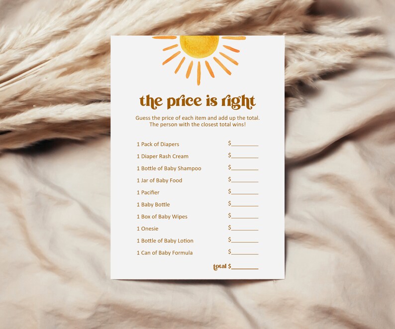 K&ouml;nnte beinhalten: Eine druckbare Spielkarte mit einer gelben Sonnengrafik und dem Text "the price is right". Das Spiel fordert die Spieler auf, den Preis verschiedener Babyartikel zu erraten, wie z. B. Windeln, Babynahrung und Feuchtt&uuml;cher.