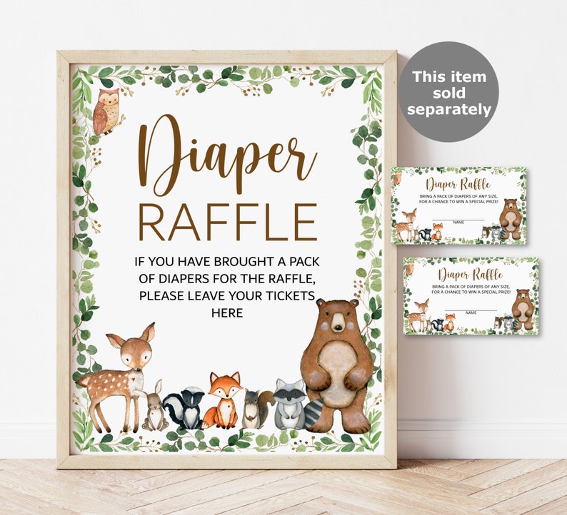 May include: A printable sign for a diaper raffle with a woodland theme. The sign features a brown bear, a deer, a fox, a rabbit, and a raccoon. The text on the sign reads "Diaper Raffle" and "If you have brought a pack of diapers for the raffle, please leave your tickets here."