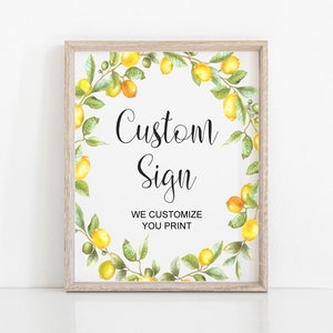May include: A printable sign with a lemon wreath border. The sign says "Custom Sign" and "We Customize You Print".