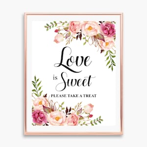 May include: A framed sign with the words "Love is Sweet" in elegant black script, surrounded by watercolor floral arrangements in pink, cream, and burgundy. The sign also includes the text "PLEASE TAKE A TREAT".
