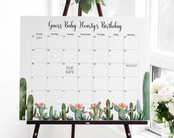 May include: A white calendar with a cactus theme, featuring the text "Guess Baby Hearty's Birthday". The calendar is set up for July and August, with the due date marked on the 28th of July.