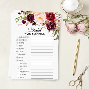 K&ouml;nnte beinhalten: Ein druckbares Brautparty-Spiel mit einem Blumendesign mit burgunderfarbenen und rosafarbenen Blumen. Das Spiel hei&szlig;t "Bridal Word Scramble" und enth&auml;lt 15 W&ouml;rter zum Entschl&uuml;sseln.