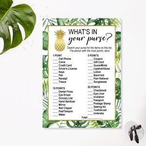 May include: A printable game card with a tropical theme. The card has a gold pineapple graphic and the text "WHAT'S IN YOUR PURSE?"  The card lists items to find in a purse and assigns points to each item.  The text "Search your purse for the items on this list. The person with the most points, wins!" is also included.