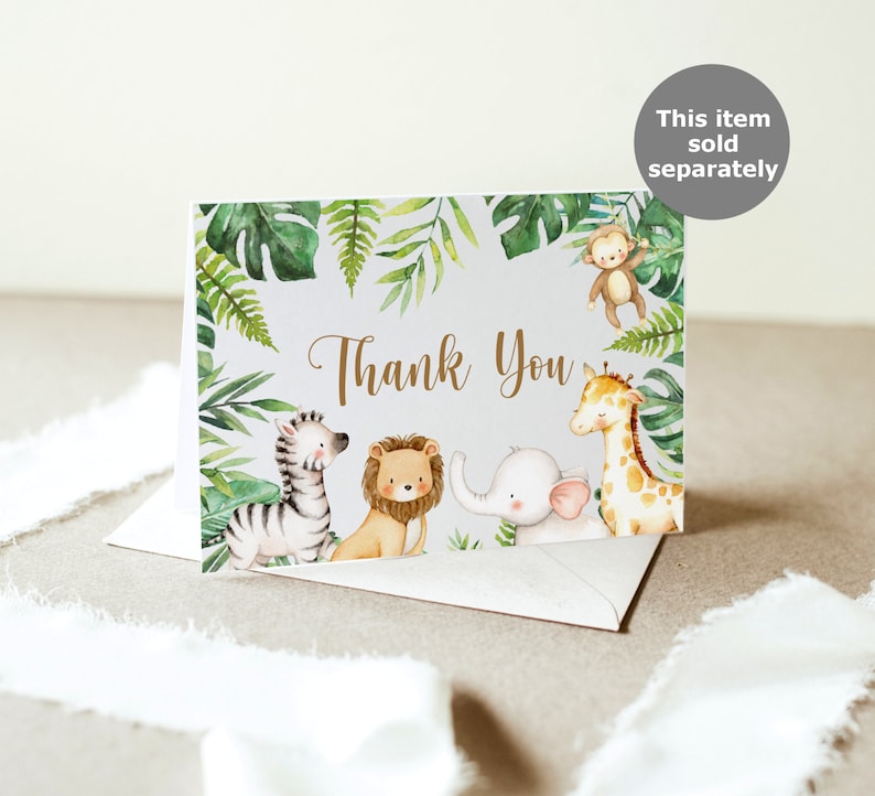 Pode incluir: Cart&atilde;o de agradecimento com tema de selva. O cart&atilde;o apresenta uma zebra, um le&atilde;o, um elefante, uma girafa e um macaco em estilo aquarela. O cart&atilde;o &eacute; cercado por folhas verdes.