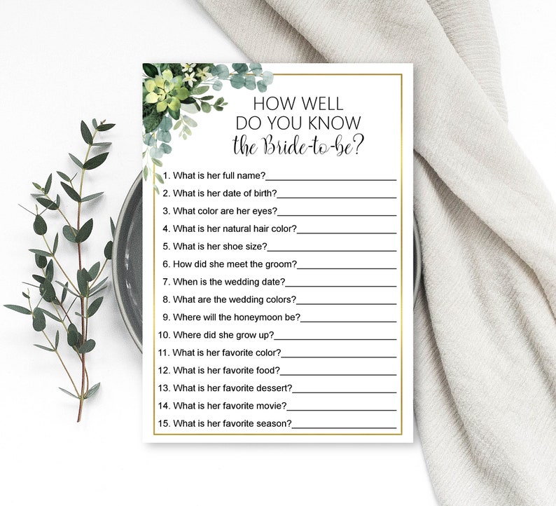 May include: A printable bridal shower game with a green floral design. The game asks guests to answer questions about the bride-to-be, such as her full name, date of birth, favorite color, and favorite season.