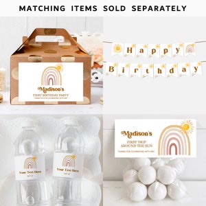 May include: A set of party supplies with a rainbow and sun theme. The set includes a favor box, a banner, water bottle labels, a favor tag, and treat bags. The text on the items reads "Madison's First Birthday Party" and "Madison's First Trip Around the Sun".
