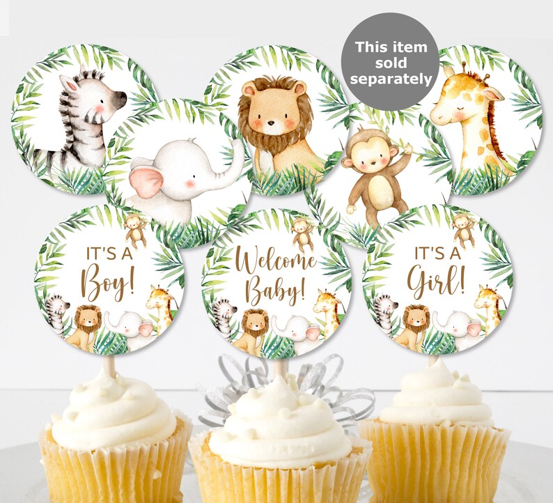 May include: Set of 8 cupcake toppers featuring jungle animals, including a zebra, elephant, lion, monkey, and giraffe. The toppers have green leaves and the text "It's a Boy!" "Welcome Baby!" and "It's a Girl!"
