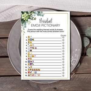 May include: A printable bridal shower game with a green floral design. The game is called "Bridal Emoji Pictionary" and asks players to guess wedding themed words and phrases represented by emojis. The game includes 15 questions with a space for players to mark their answers.